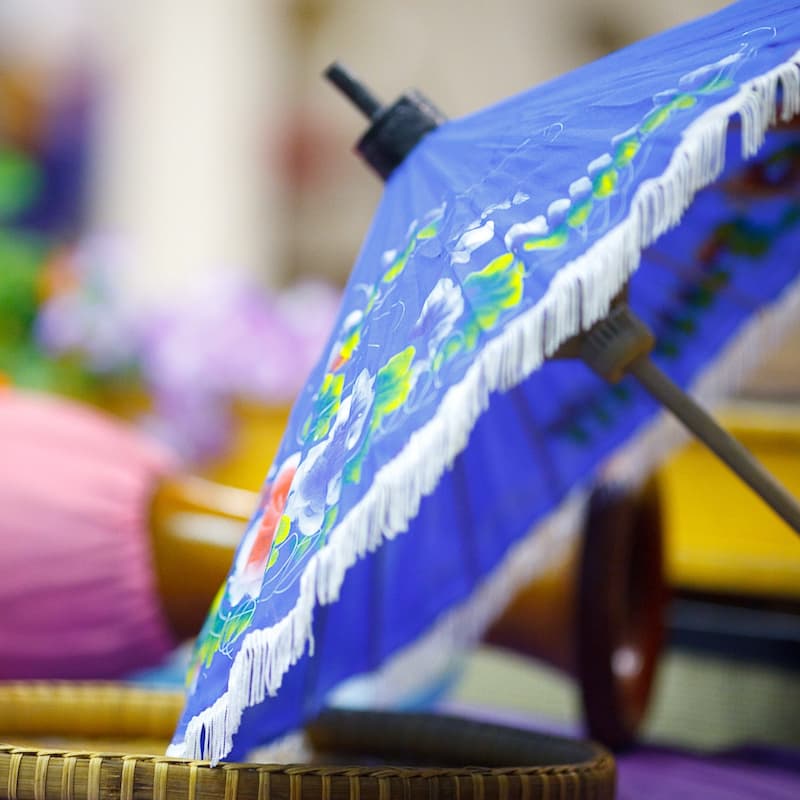 Handcrafted Cambodian dance costumes and umbrella props